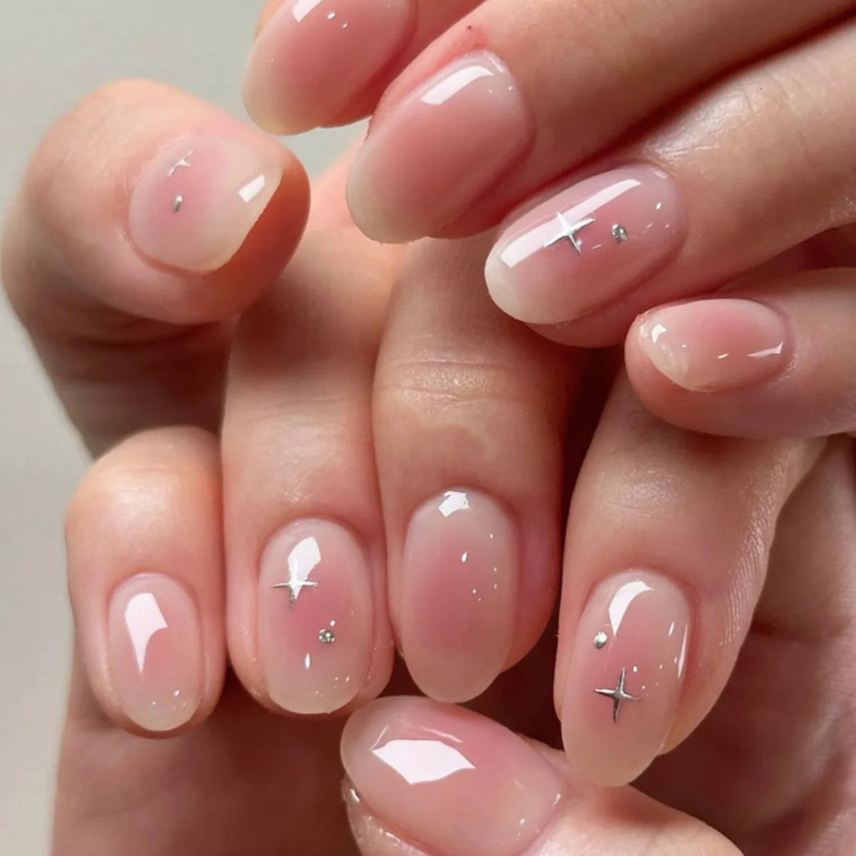 Aurora Glow Press-On Nails – pink French-tip nails with small crystal accents | Glow Vanta