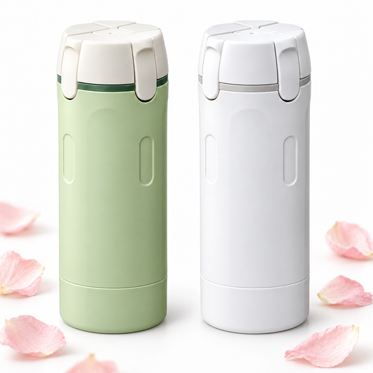 GlowPod green and white four-in-one travel dispensers with soft pink petals