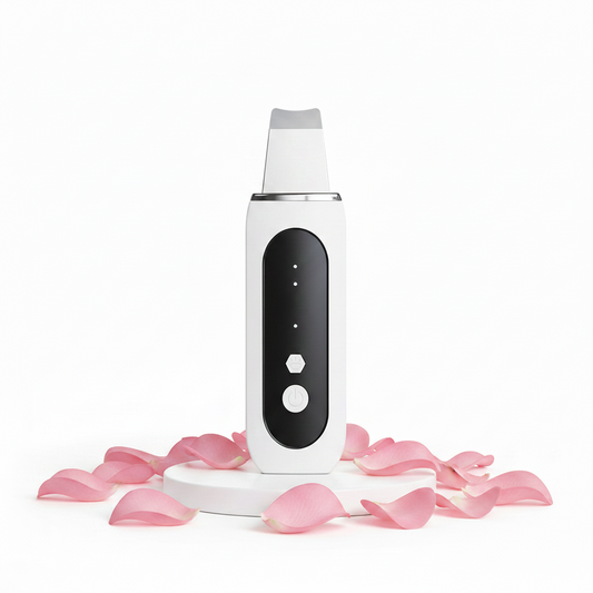 GlowSonic Cleanser – white ultrasonic skin scrubber on a soft pink background | Glow Vanta