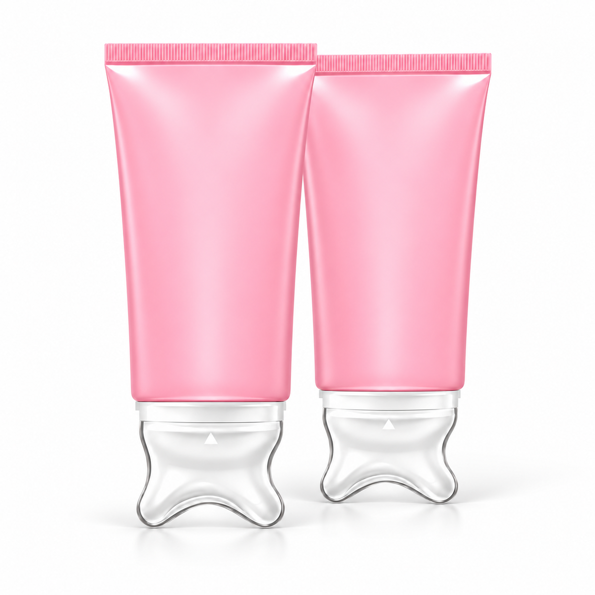 Two pink NeckSilk neck cream tubes with clear massage applicators