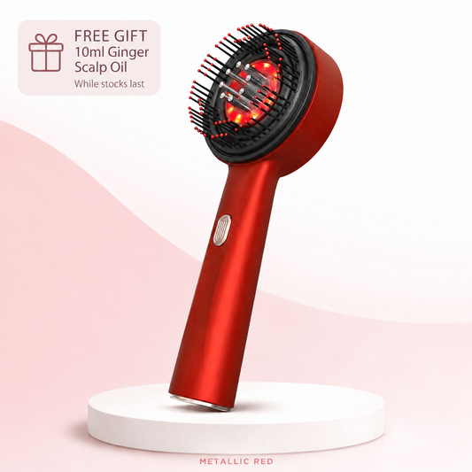 Metallic red RadiScalp brush on a white plinth with free 10ml Ginger Scalp Oil, while stocks last | Glow Vanta