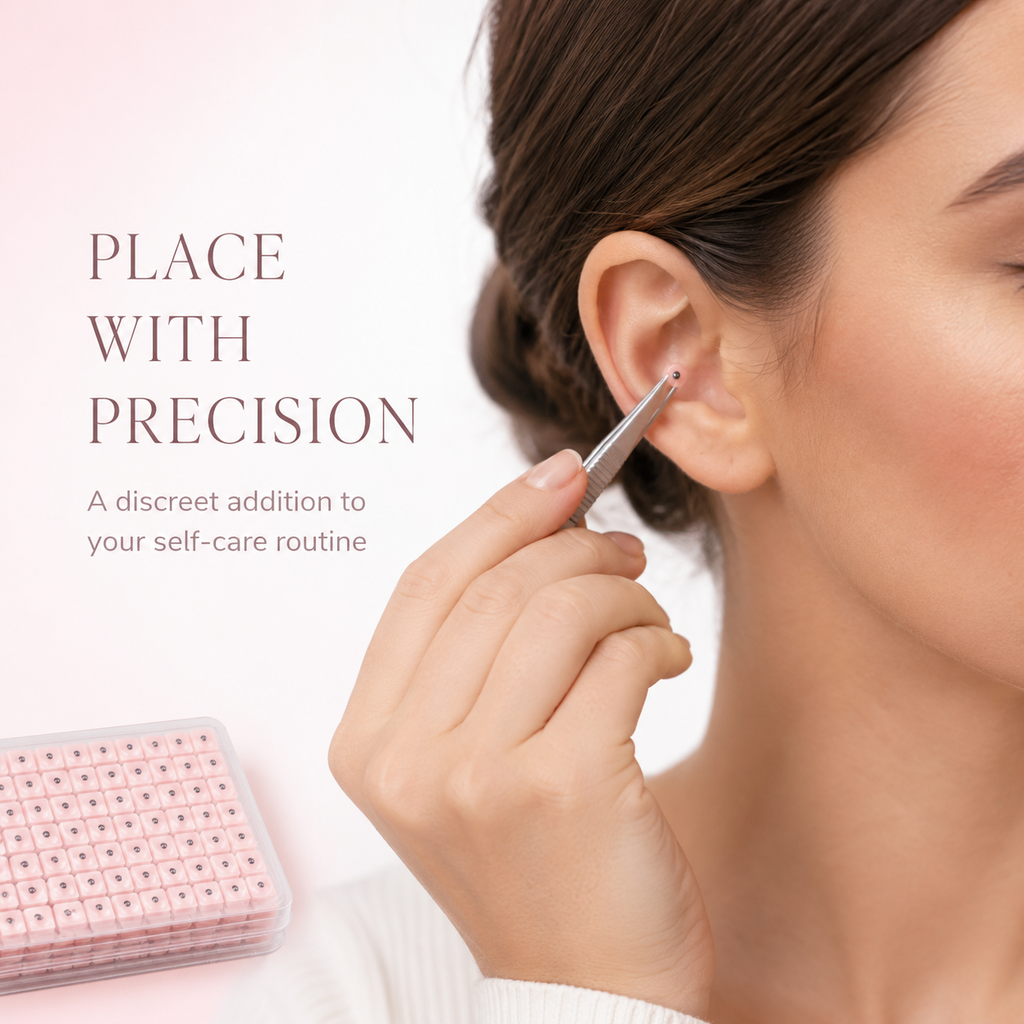 Applying a SerenEar ear seed with precision tweezers